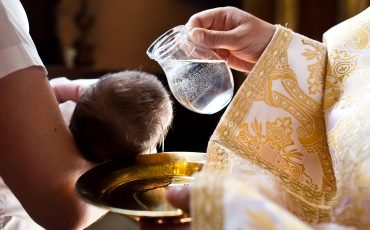 Infant,Baptism.,Water,Is,Poured,On,The,Head,Of,An
